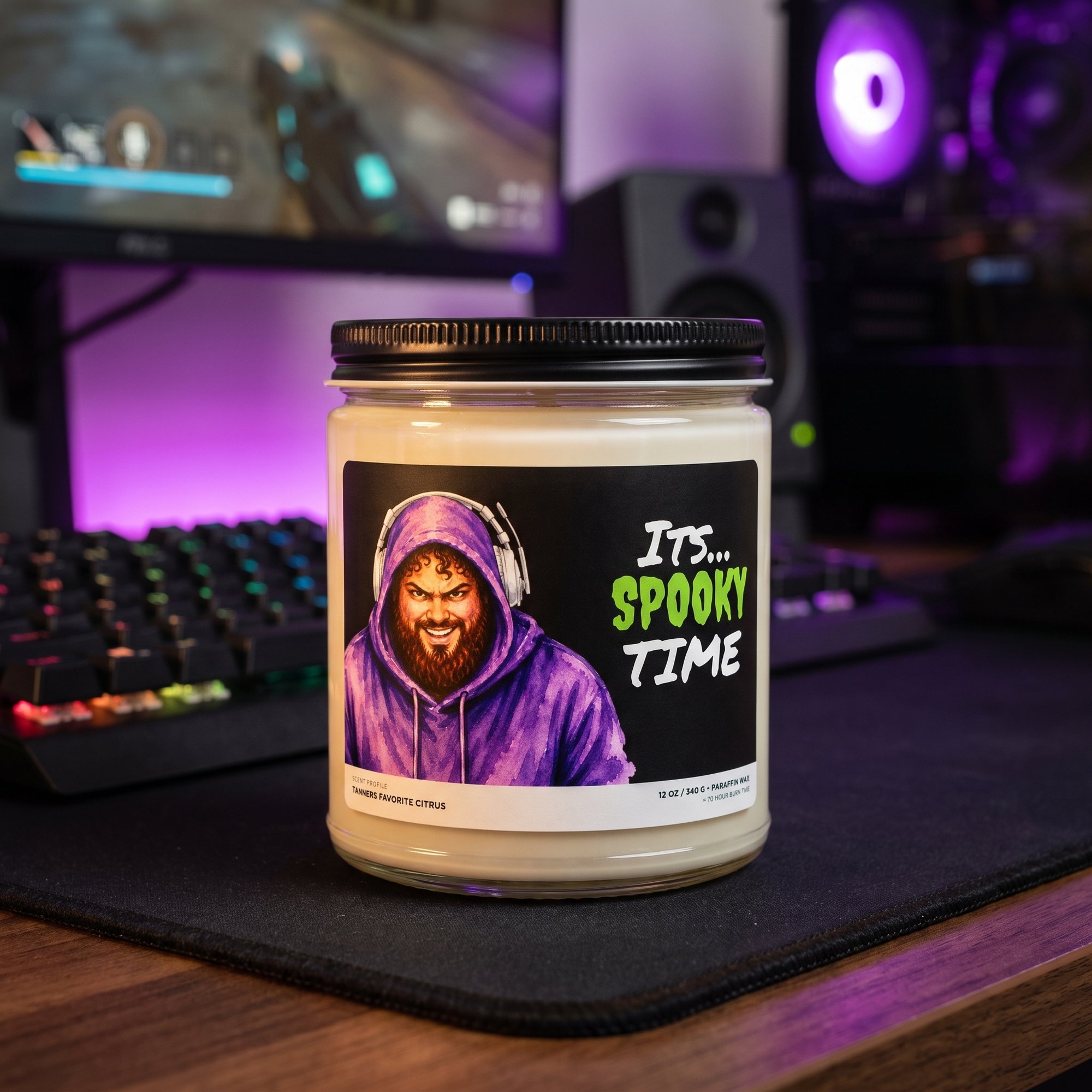 Its Spooky Time candle on a gaming desk, 12 oz paraffin candle in a glass jar