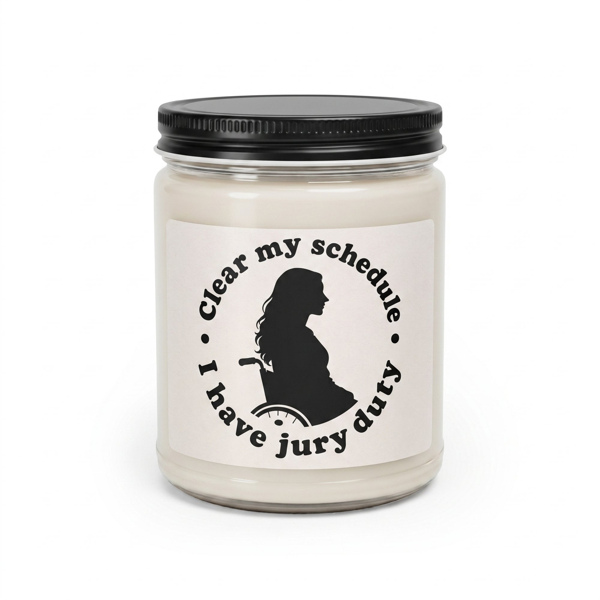 Lindsay Clancy candle, 12 oz paraffin candle in a glass jar with a black lid
